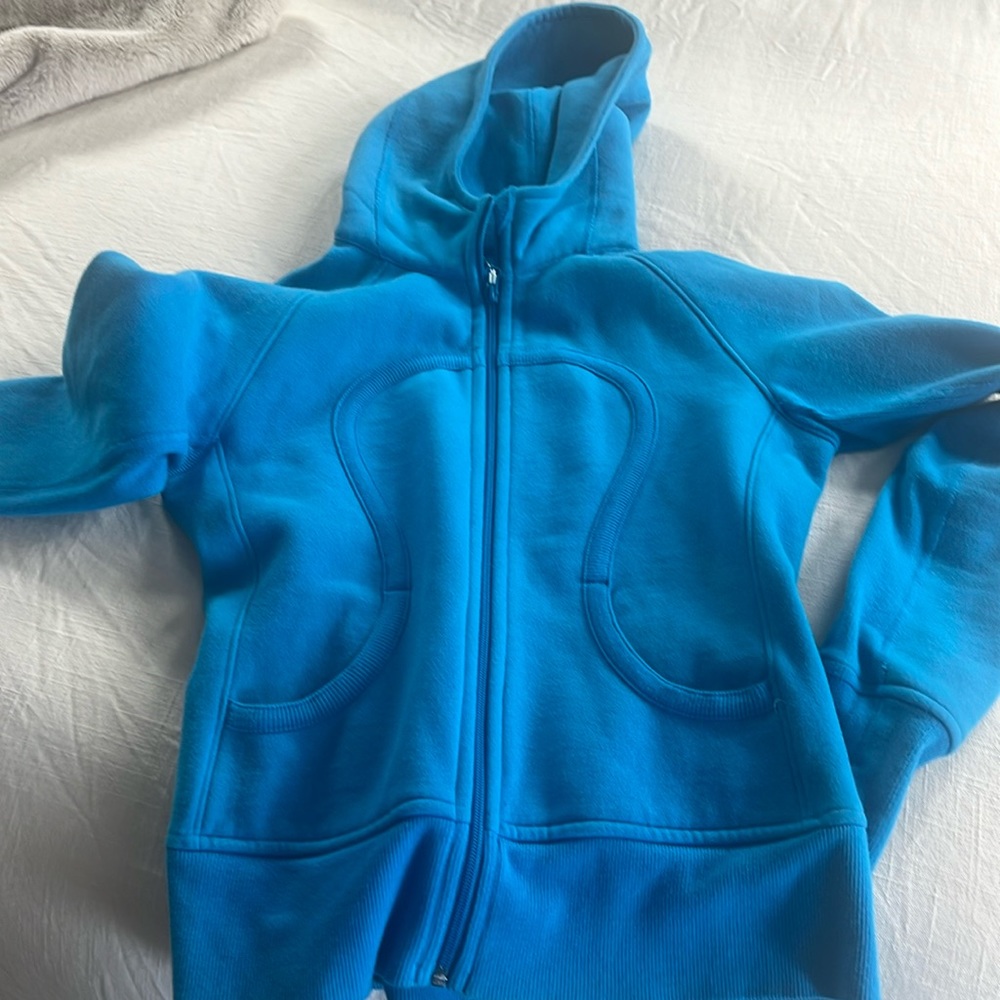Lululemon full-zip blue Scuba, great shape. Size 8, but fits slim.
